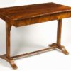 A Biedermeier single drawer writing table