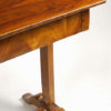 A Biedermeier single drawer writing table