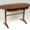 A Biedermeier single drawer writing table