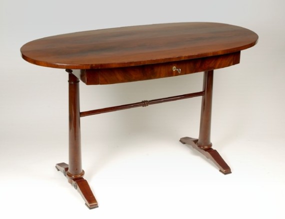 A Biedermeier single drawer writing table