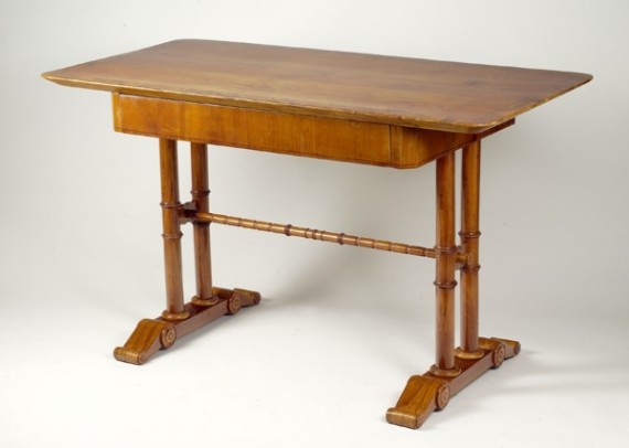 A Biedermeier single drawer writing table