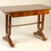 A Biedermeier single drawer writing table