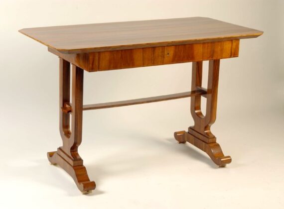 A Biedermeier single drawer writing table