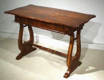 A Biedermeier single drawer writing table