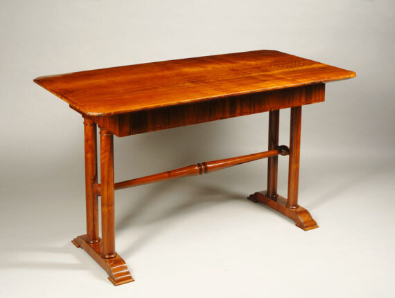 A Biedermeier single drawer writing table
