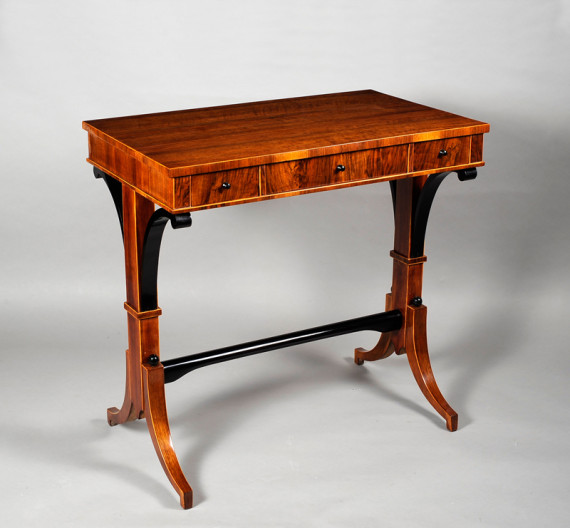 An elegant three drawer Biedermeier occasional table