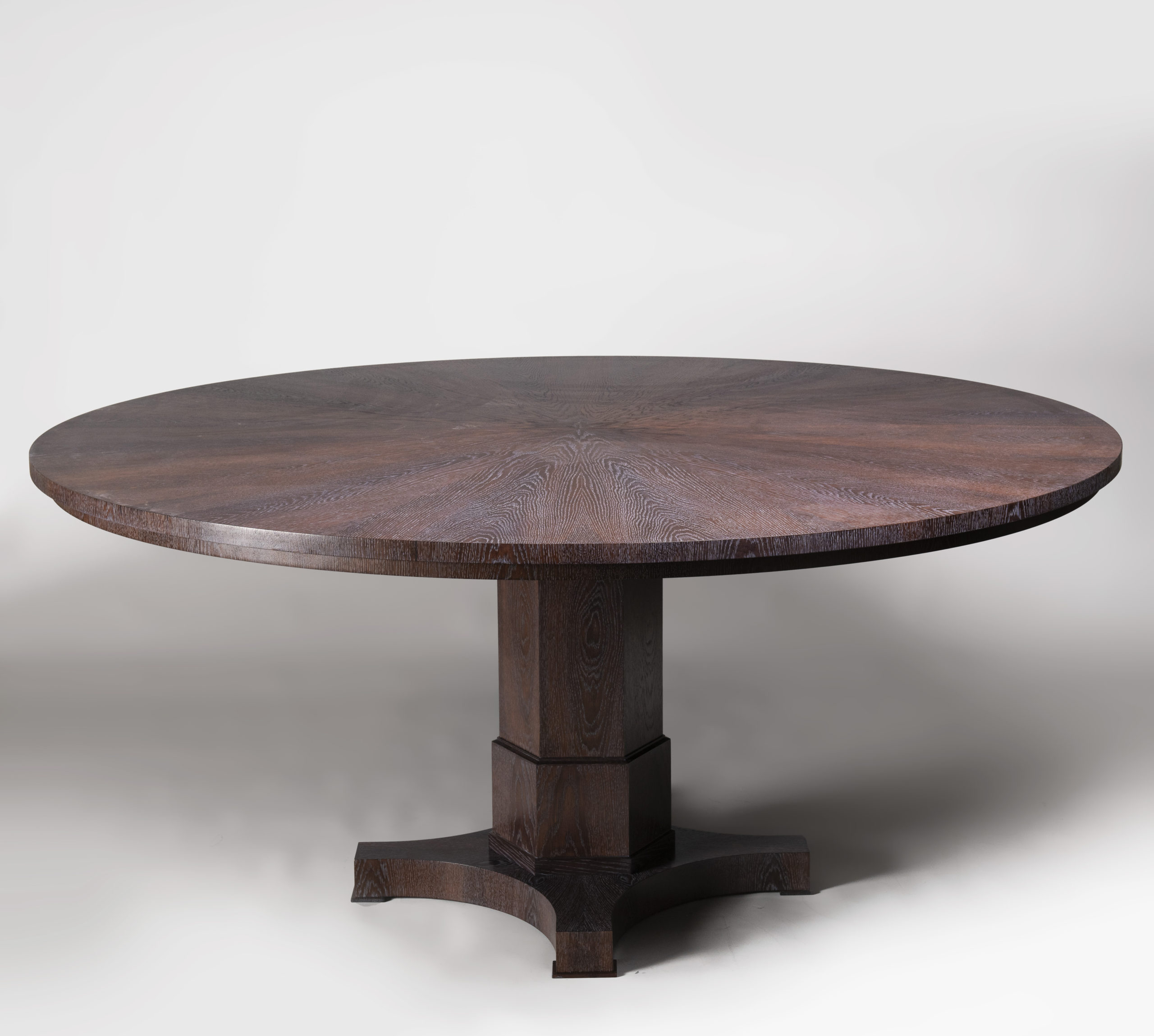 A Pedestal Dining Table by ILIAD Design