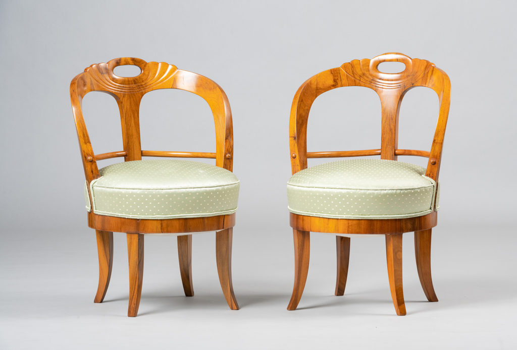 A Pair of Biedermeier Fireside Chairs