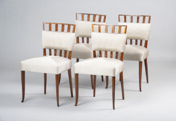 A Set of Four Elegant Halter-Top Dining Chairs