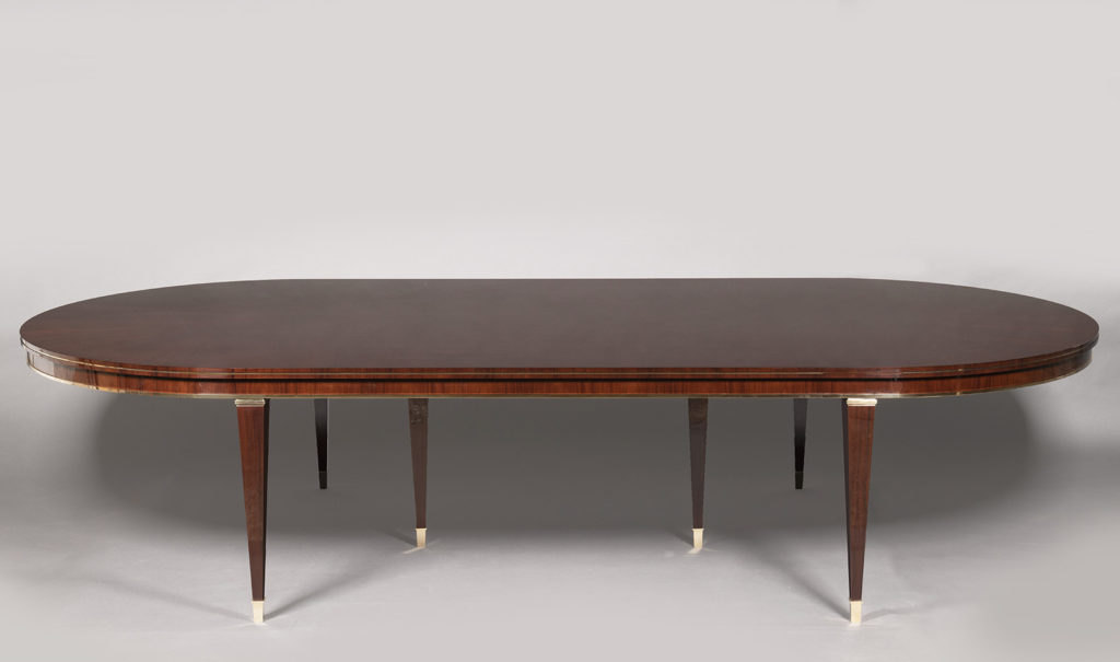 A Mid-Century Style Dining Table by ILIAD Design