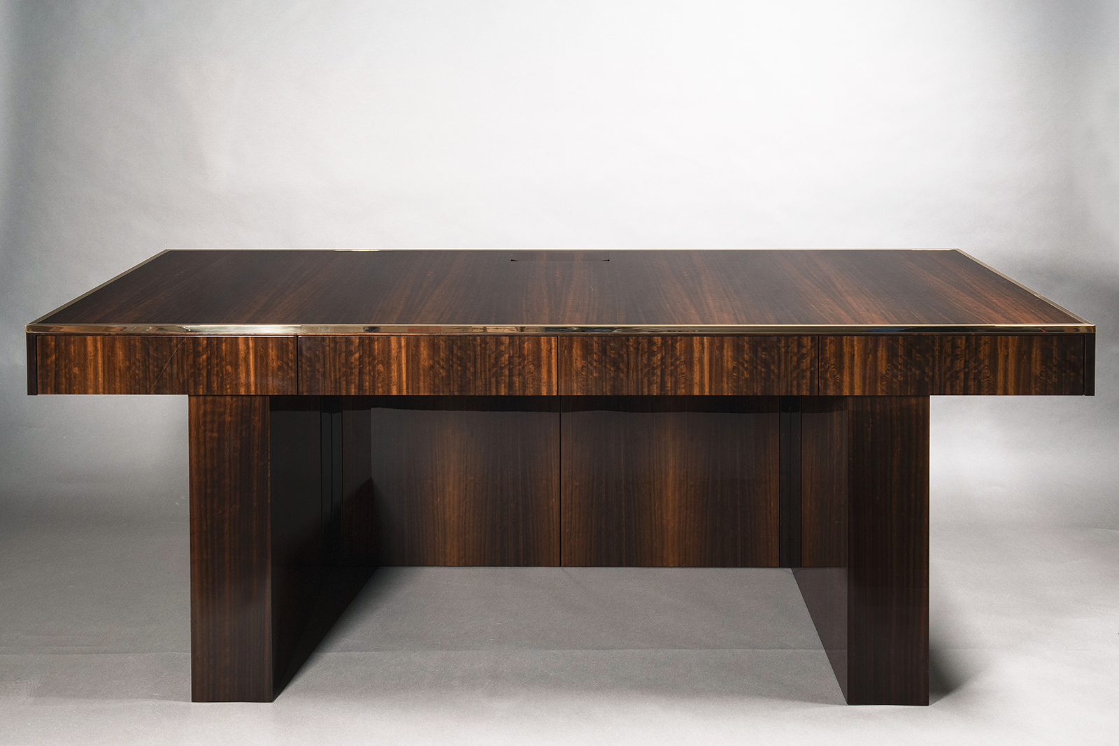 A Large Modernist Director’s Desk by ILIAD Design